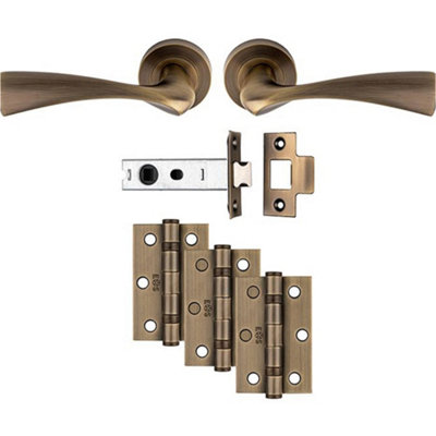 Loops Premium Door Handle & Latch PackAntique Brass Curved Flair Lever Round Rose from B&Q