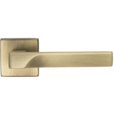 Loops Premium Contoured Door Handle SetAntique Brass Sleek Lever On Square Rose