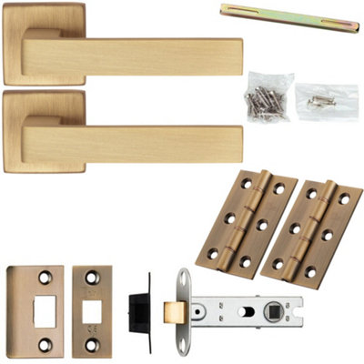 Loops Door Handle & Latch PackAntique BrassFlat Slim Bar Lever On Square Rose from B&Q