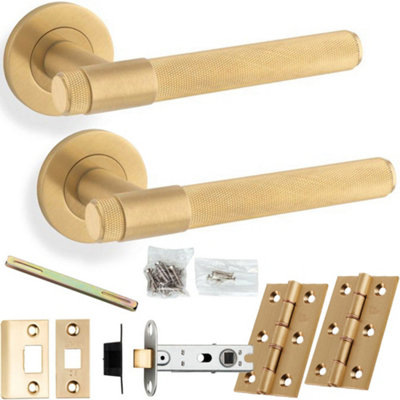 Loops Door Handle & Latch PackSatin BrassModern Knurled Bar Lever On Round Rose from B&Q