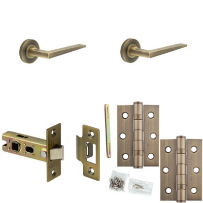 Loops Door Handle & Latch Set Antique Brass Slim Mitred Lever Round Knurled On Rose from B&Q