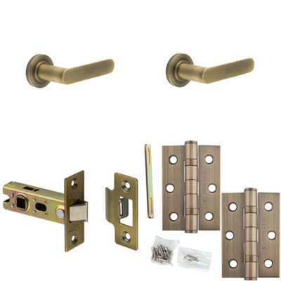Loops Door Handle & Latch Set Antique Brass Flat Lever Round Reeded On Rose