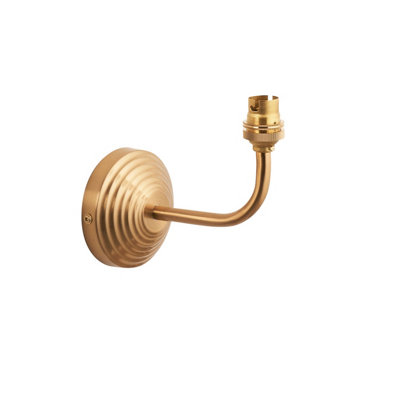 Loops Stylish Dimmable Wall Light With Aged Brass Finish And Reeded Arc Arm Sconce from B&Q
