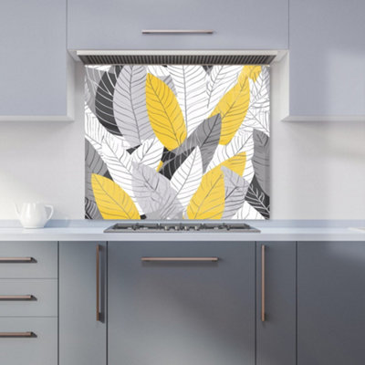 B&Q -  Yellow Grey Feather Leaves Premium Glass Kitchen Splashback W600mm X H750mm
