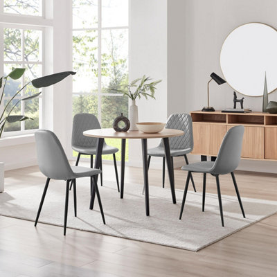 Furniturebox Uk Koko Oak Effect Round Dining Table & 4 Grey Corona Black Leg Chairs from B&Q