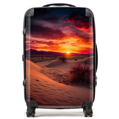Warren Reed Designer Sunset In The Desert SuitcaseMedium from B&Q