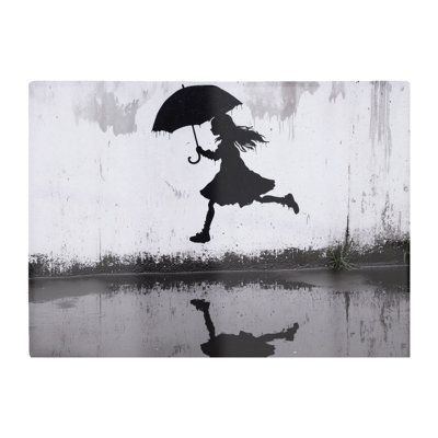 Warren Reed Designer Jumping Over Puddles Chopping Board from B&Q