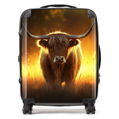 Warren Reed Designer Highland Cow Sunset SuitcaseLarge from B&Q