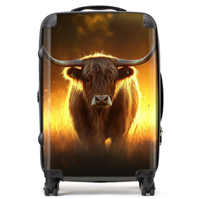 Warren Reed Designer Highland Cow Sunset SuitcaseMedium from B&Q