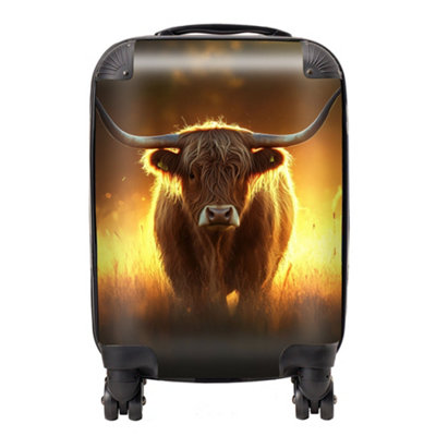 Warren Reed Designer Highland Cow Sunset SuitcaseMini Cabin from B&Q