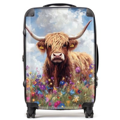 Warren Reed Designer Highland Cow In A Summer Meadow SuitcaseMedium from B&Q