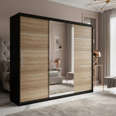 Astra 23 Modern Sliding Door Wardrobe Black Sonoma Bedroom Storage With Shelves And Hanging Rails Durable Laminated Finish from B&Q
