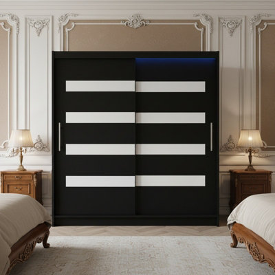 Bega Xi 180 Cm Sliding Door Wardrobe With Shelves And Hanging Rail Storage Black With White And Led Lights from B&Q