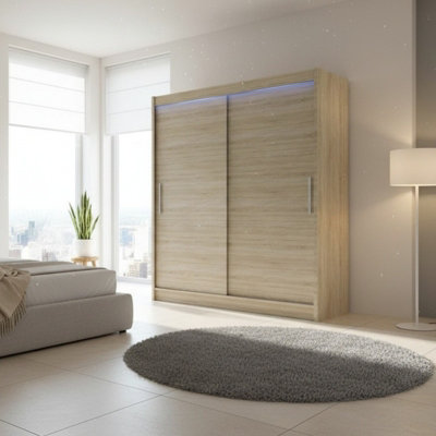Modern Sliding Door Wardrobe Bega I 180Cm Sonoma With Led Lights from B&Q