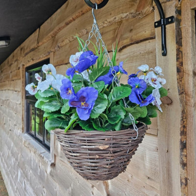 Best Artificial Lilac & White Pansy Flower With Decorative Rattan Hanging Basket For Indoor Or Outdoor Use from B&Q
