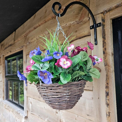 Best Artificial Plum & Lilac Pansy Flower With Decorative Rattan Hanging Basket For Indoor Or Outdoor Use from B&Q