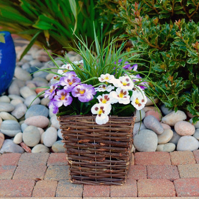 Best Artificial Pre-Made 44Cm/17In Purple & White Pansy Flowers In Rattan Wicker Planter PotSuitable For Outside Use from B&Q