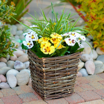 Best Artificial Pre-Made 44Cm/17In Yellow & White Pansy Flowers In Rattan Wicker Planter PotSuitable For Outside Use from B&Q