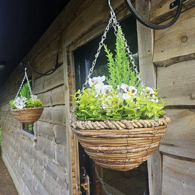 Pair Of Best Artificial 10 Inch White Pansy Spring Hanging Basket With Greenery And Conifer Centre from B&Q