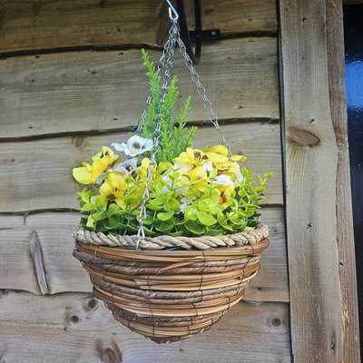 Best Artificial 10 Inch Yellow & White Pansy Spring Hanging Basket With Greenery And Conifer Centre from B&Q