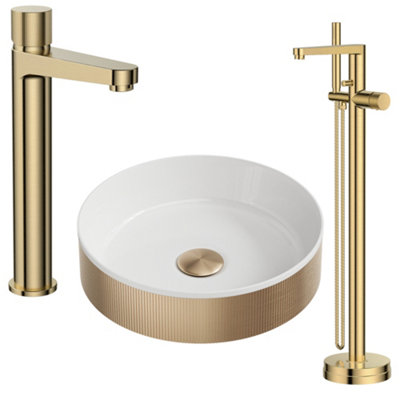 FNX Bathrooms Brushed Brass Fluted Countertop Bathroom Basin Tall Mono Mixer Tap And Floorstanding Bath Shower Mixer With Matching Basin Waste from B&Q