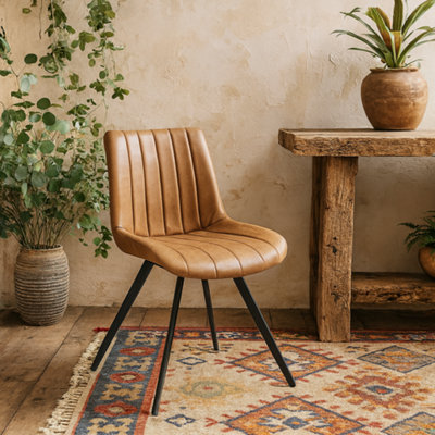 Wyld Haus Arques Tan Faux Leather Swivel Dining Chair from B&Q