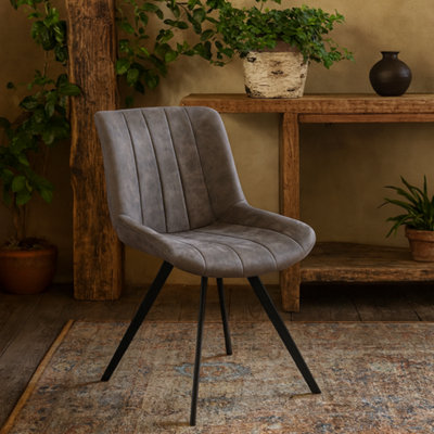 Wyld Haus Arques Swivel Dining Chair Grey Faux LeatherIndustrial Metal Base from B&Q