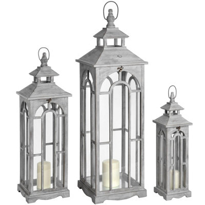 Wyld Haus Set Of Three Greywashed Wooden Lanterns With Arched Windows And Handles from B&Q