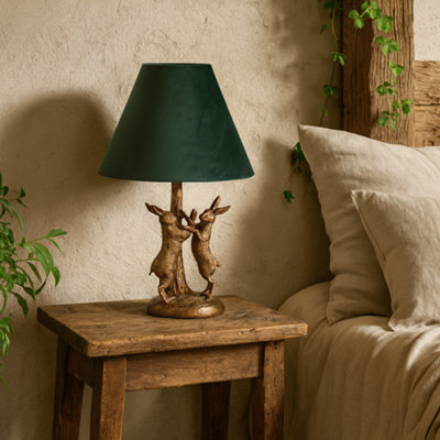 Wyld Haus Sault Antique Gold Marching Hares Lamp With Green Velvet Shade from B&Q