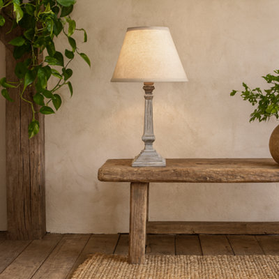 Wyld Haus Collioure White Washed Wooden Pedestal Table Lamp With Cream Linen Shade from B&Q