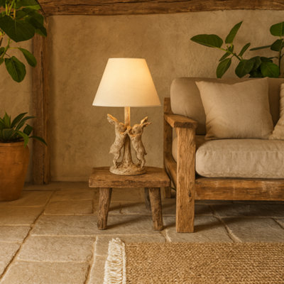 Wyld Haus Stonewashed Marching Hares Table Lamp With Linen Shade from B&Q