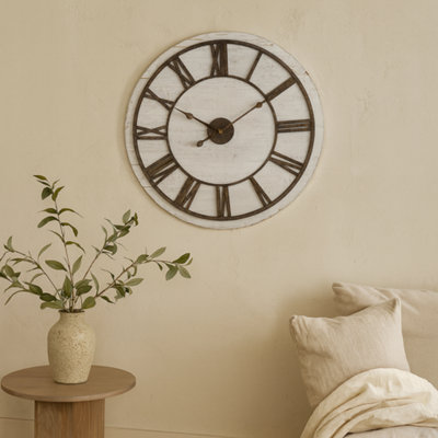 Wyld Haus 70Cm Rustic Whitewashed Wooden Wall Clock With Aged Metal Roman Numerals from B&Q