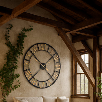 Wyld Haus 95Cm Industrial Black And Gold Metal Roman Numeral Open Frame Wall Clock from B&Q