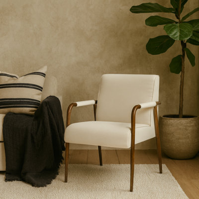 Wyld Haus Luxemburg Cream Velvet Armchair With Brass Arms And Tapered Legs from B&Q