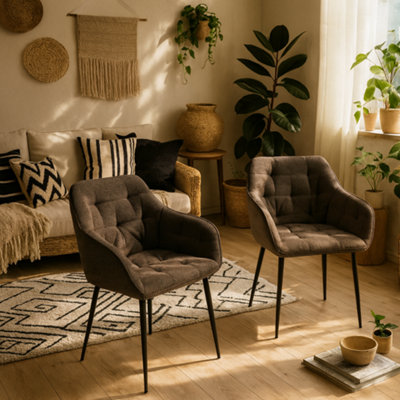 Wyld Haus Buttonfern Set Of 2 Taupe Bouclé Tufted Dining Chairs With Armrests And Black Steel Legs from B&Q