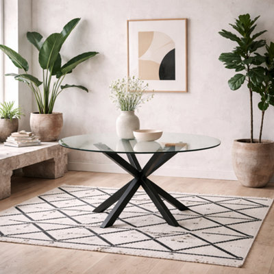 Wyld Haus Perth 119Cm Round Tempered Glass Dining Table With Matte Black Metal Cross Base Seats 4 from B&Q
