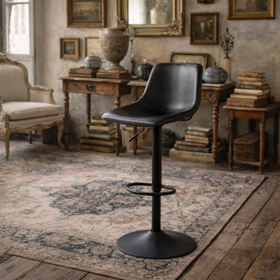 Wyld Haus Bogense Adjustable Black Faux Leather Bar Stool With Cream Zigzag Stitching from B&Q