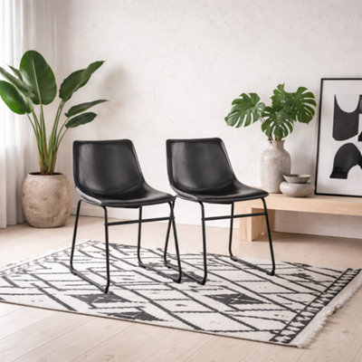 Wyld Haus Set Of 2 Bogense Black Faux Leather Dining Chairs With Cream Zigzag Stitching from B&Q