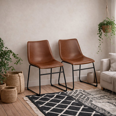 Wyld Haus Bogense Set Of 2 Tan Faux Leather Dining Chairs With Cream Stitching from B&Q