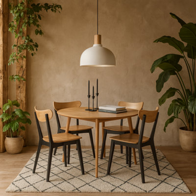 Wyld Haus Krakow 5-Piece Dining Set   Natural Oak Effect Round Table And 4 Black Chairs from B&Q