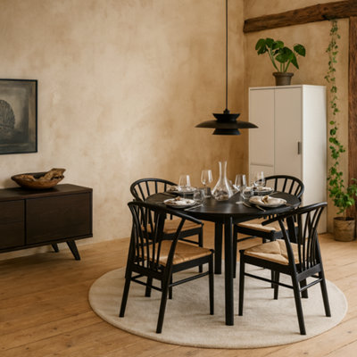 Wyld Haus Krakow Round Extending Dining Set With 4 ChairsMatte Black from B&Q