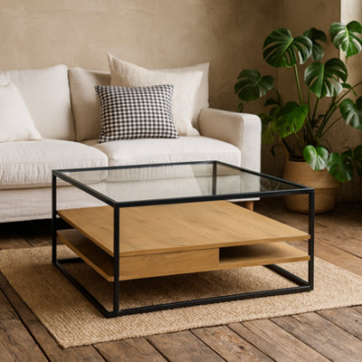 Wyld Haus Wrenna Square Coffee Table With Tempered Glass Top And Oak Effect ShelvesBlack Frame from B&Q