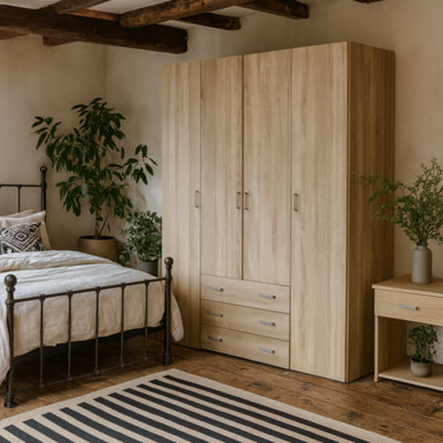 Wyld Haus Berlin Oak Effect Wardrobe 4 Doors 3 Drawers 4 Shelves Natural Finish from B&Q