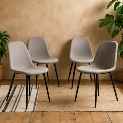 Wyld Haus Set Of 4 Venice Light Grey Fabric Dining Chairs With Black Steel Legs from B&Q