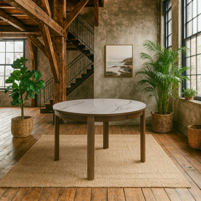 Wyld Haus Cork Round Extendable Dining Table With Cream Ceramic Top And Oak Veneer Base from B&Q