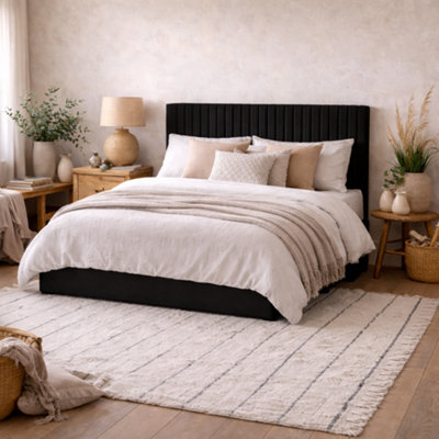 Wyld Haus Dublin 5Ft King Ottoman Bed Black Velvet Tall Ribbed Headboard from B&Q