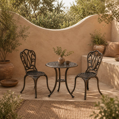 Wyld Haus Niso 3-Piece Bronze-Tone Aluminium Bistro Set With Umbrella Hole2 Chairs And Round Table from B&Q