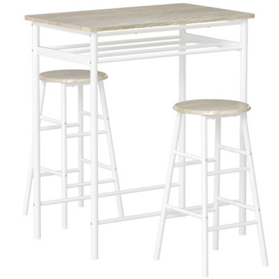 Wyld Haus Fira Rodo 3-Piece White And Oak Breakfast Bar Table And Stool Set With Storage from B&Q