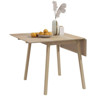 Wyld Haus Nolilu Solid Wood Folding Drop Leaf Dining TableNatural FinishSeats 2 To 4 from B&Q