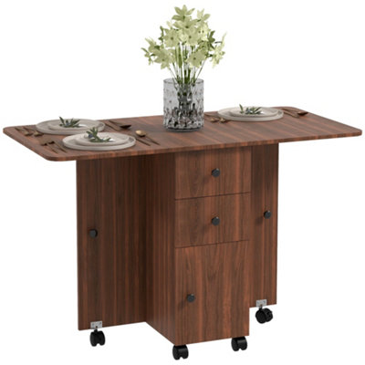 Wyld Haus Difive Raka Distressed Brown Drop Leaf Dining Table With StorageSeats 6 from B&Q